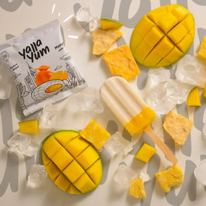 Freeze-dried mango snack, fresh mango, and mango popsicle with ice from iPlantBased UAE
