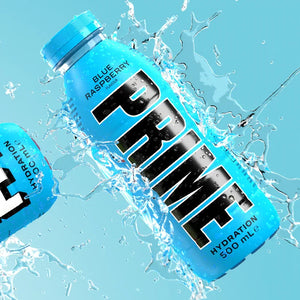 Blue raspberry PRIME hydration drink bottle with water splash, refreshing beverage