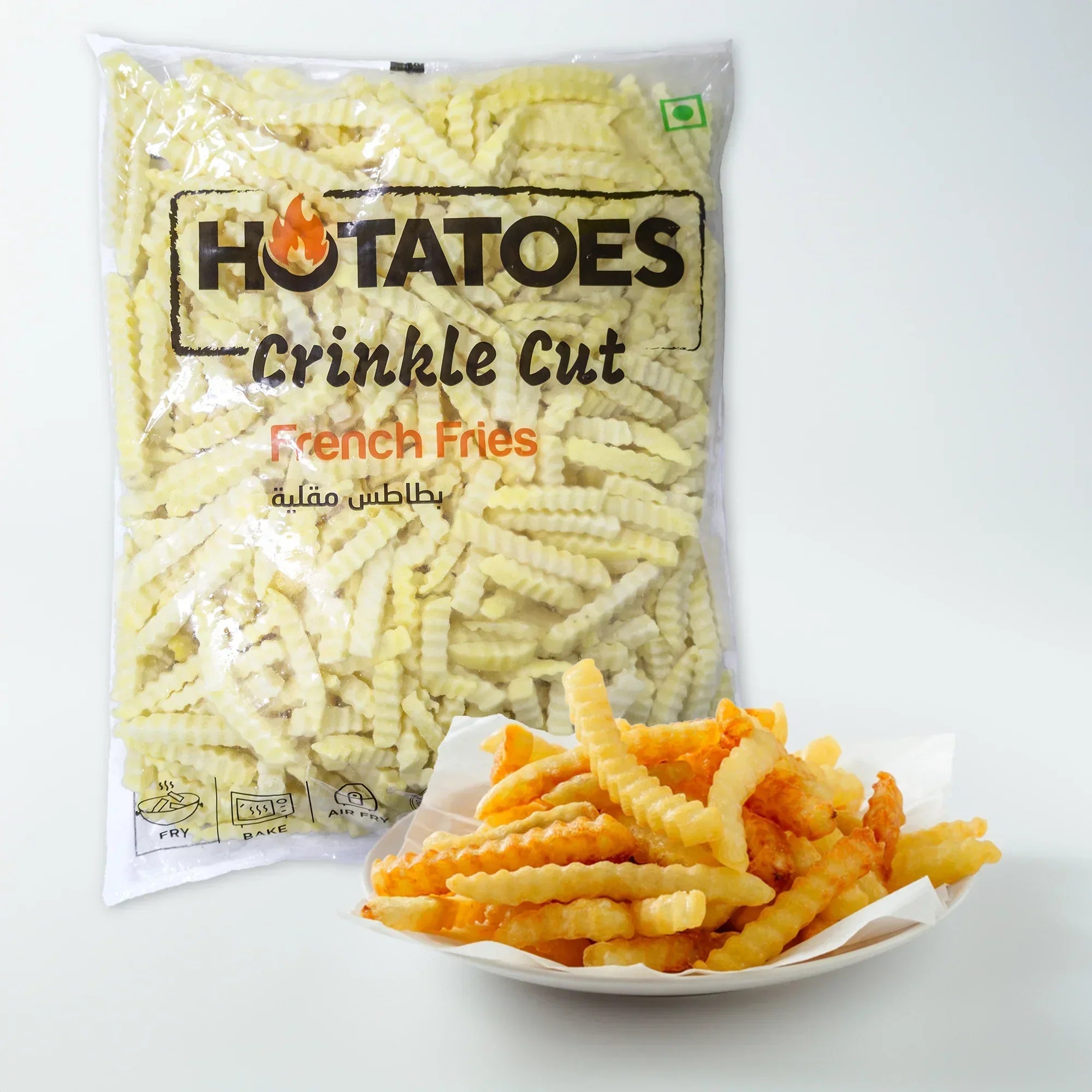 Hotatoes Crinkle Cut French Fries frozen pack with cooked fries on a plate, plant-based food UAE