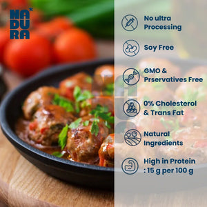 Plant-based meat-free burger patties in sauce, garnished with herbs, healthy vegan food in UAE.